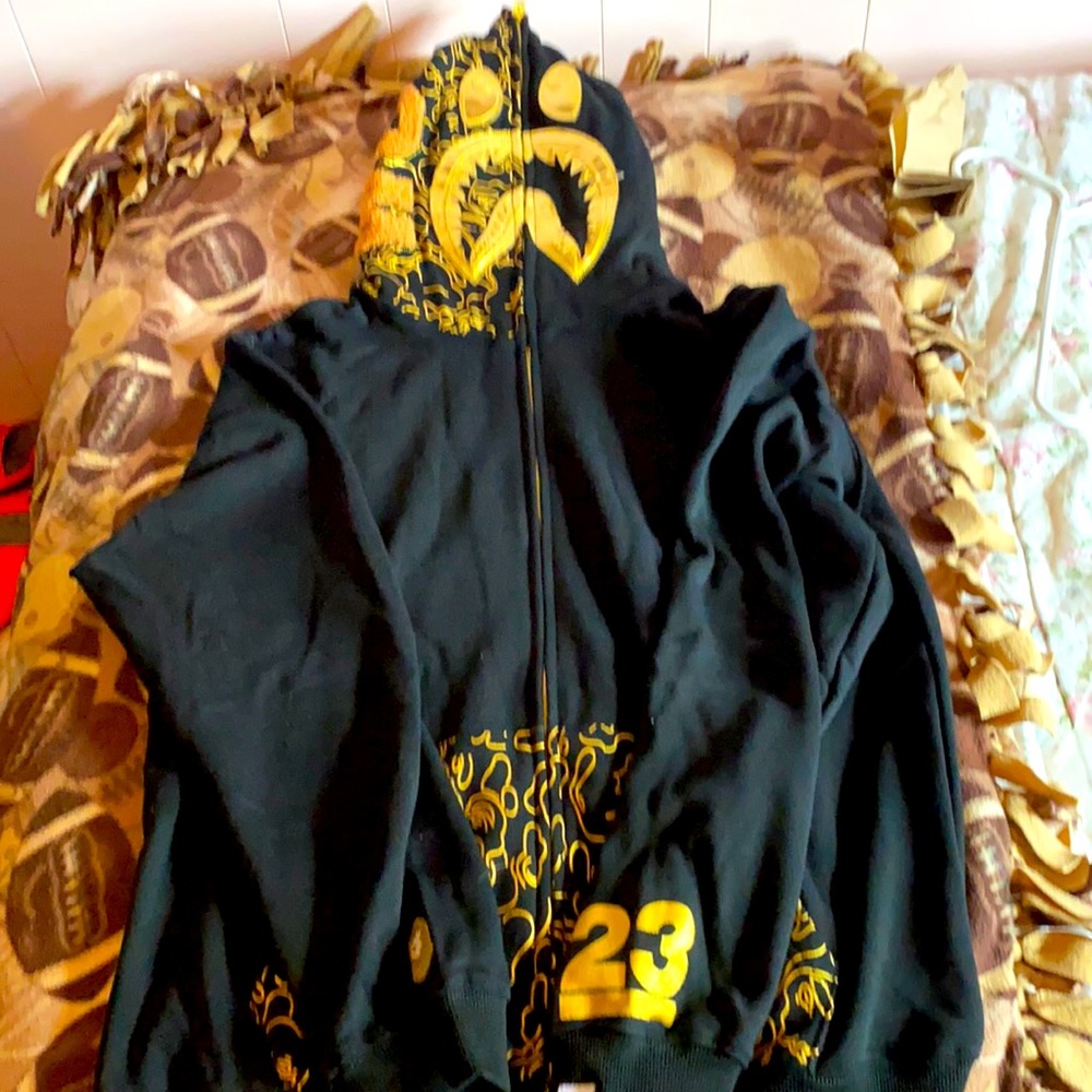 Bape limited edition black and gold hoodie.